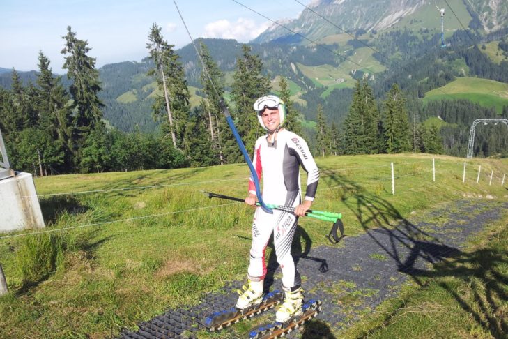 Riding the lift with grass skis.