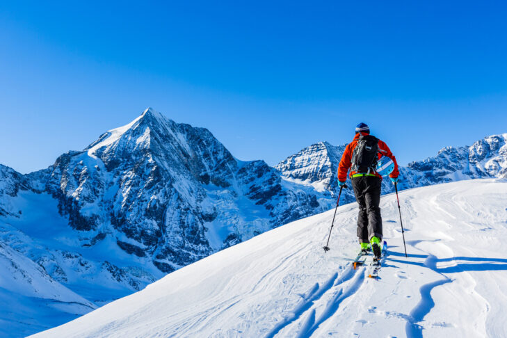 Ski mountaineers need special touring skis to be able to climb the mountain before making their descent.
