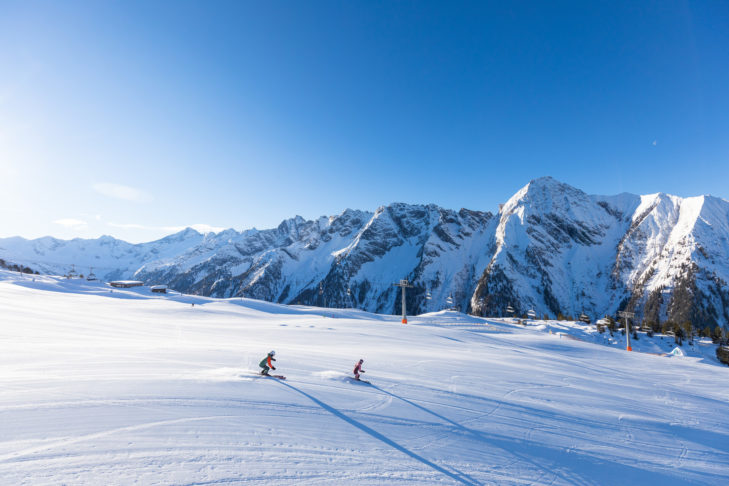 Skigebiete im Zillertal, wie hier das in Mayrhofen, zählen auch dank der ausgezeichneten Unterkünfte in den Orten zu den beliebtesten Destinationen der SnowTrex-Kunden.