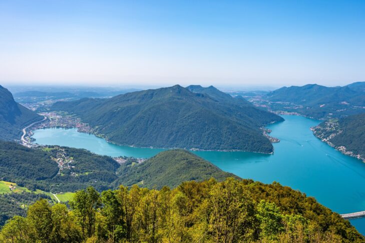 In der Schweiz finden Besucher einige der schönsten Seen Europas, so wie den Luganersee.